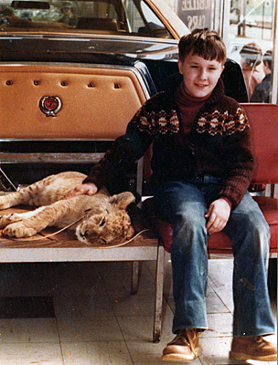 with cougar cub at car dealership